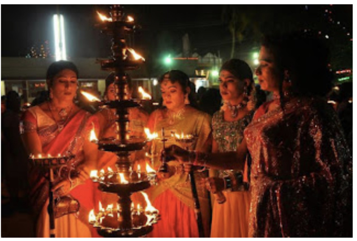 Crossdressed men in Kerala, India, gather to worship the goddess Bhagavathy.