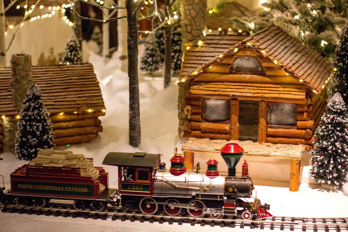A Christmas display of Big Cedar Lodge, Ridgedale, United States. Log cabins circled by a train called White Christmas Express.