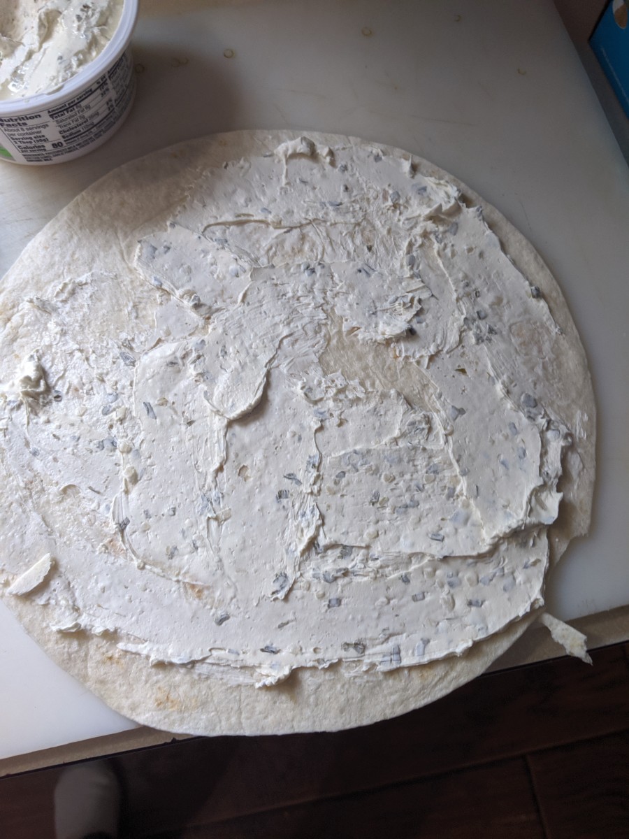 Cream cheese on the tortilla. 