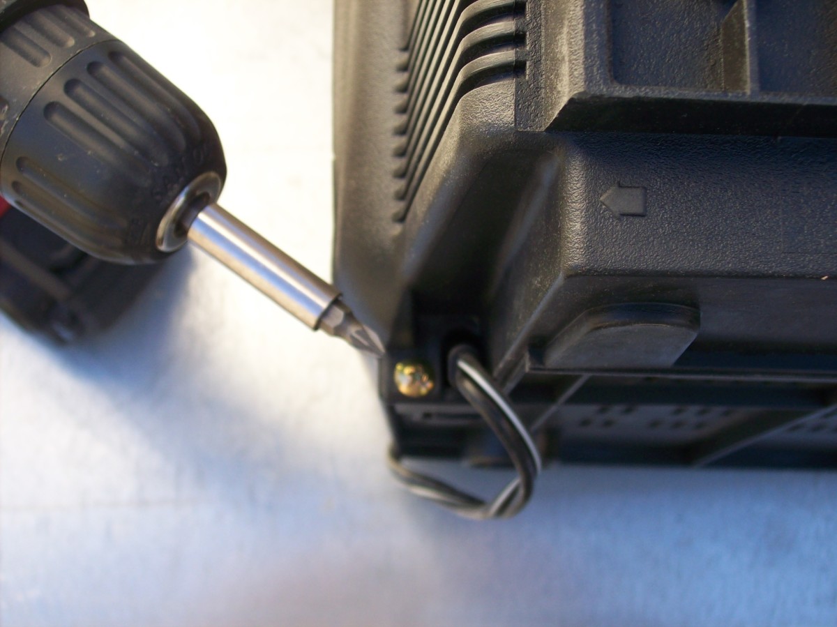 Those 4 screws release the back case.