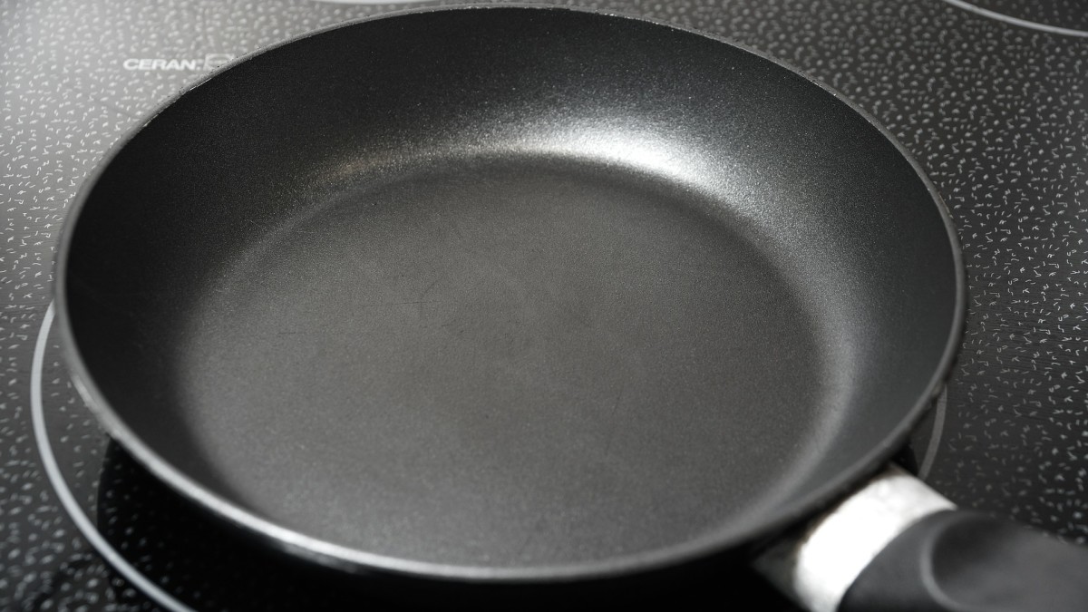 Polytetrafluoroethylene is the material used to store fluoroantimonic acid. It is the same material used to coat the inner part of nonstick cookware.