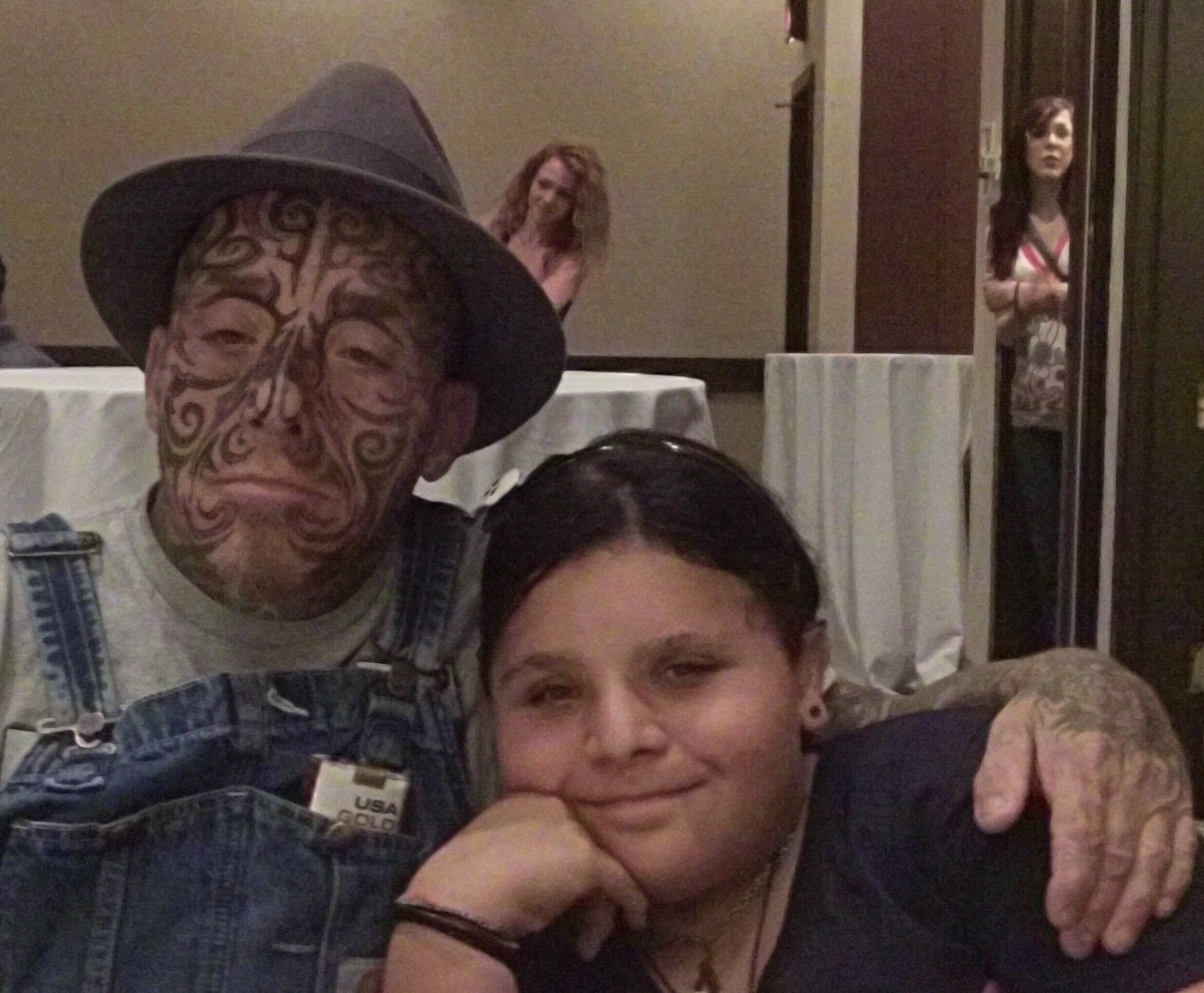 Otto Long with his daughter at the 17th Annual NC Tattoo Convention. Click the link below to see more about Otto and Creatures of the Night.