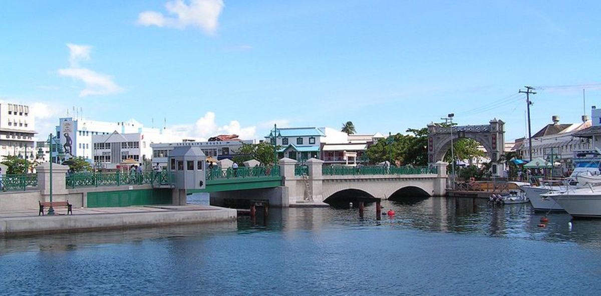 The Chamberlain Bridge spanning the Careenage(Constitution River) along with the Independence Arch in Bridgetown, Barbados.
