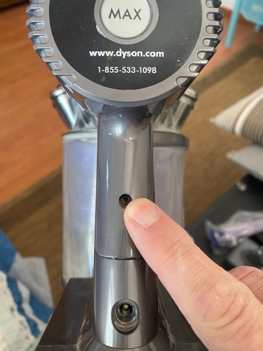 Screw on front of Dyson