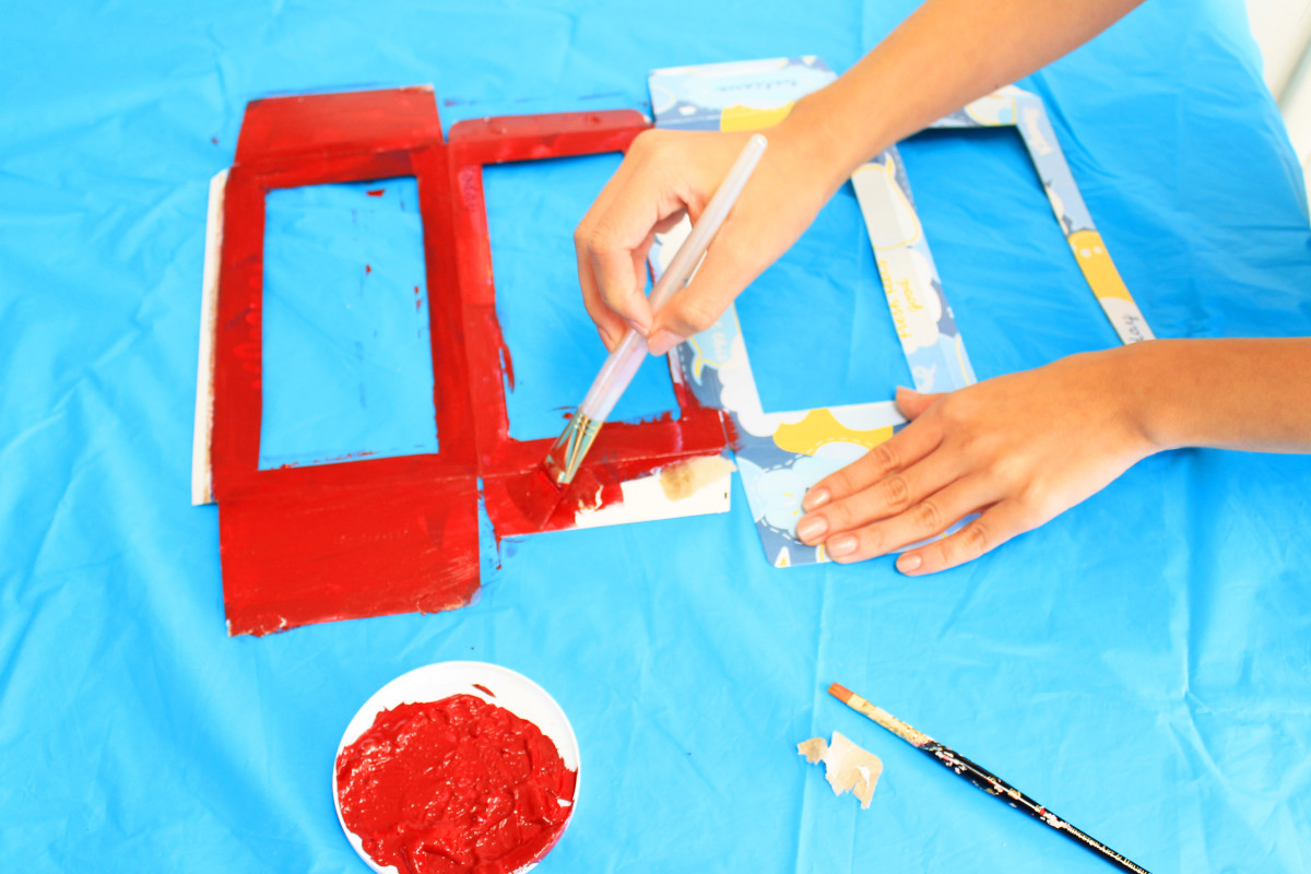 Use acrylic paint for the outside of the box. You will probably need two coats.