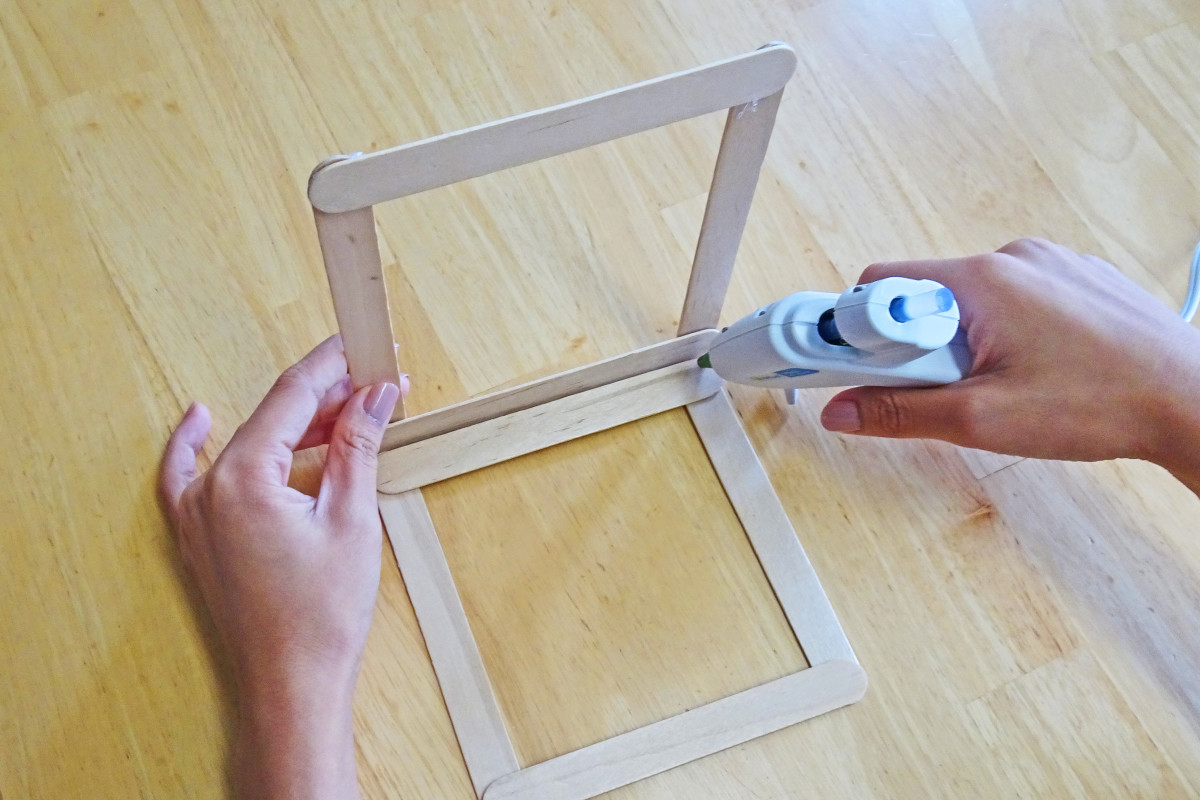 Make sure the flat sides line up as you glue the squares together. It may help to have someone else hold one of the squares as you glue.