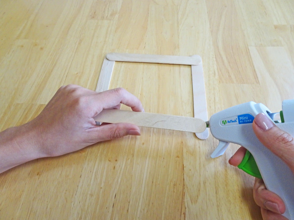 When gluing the square, make sure that parallel  craft sticks are on top.