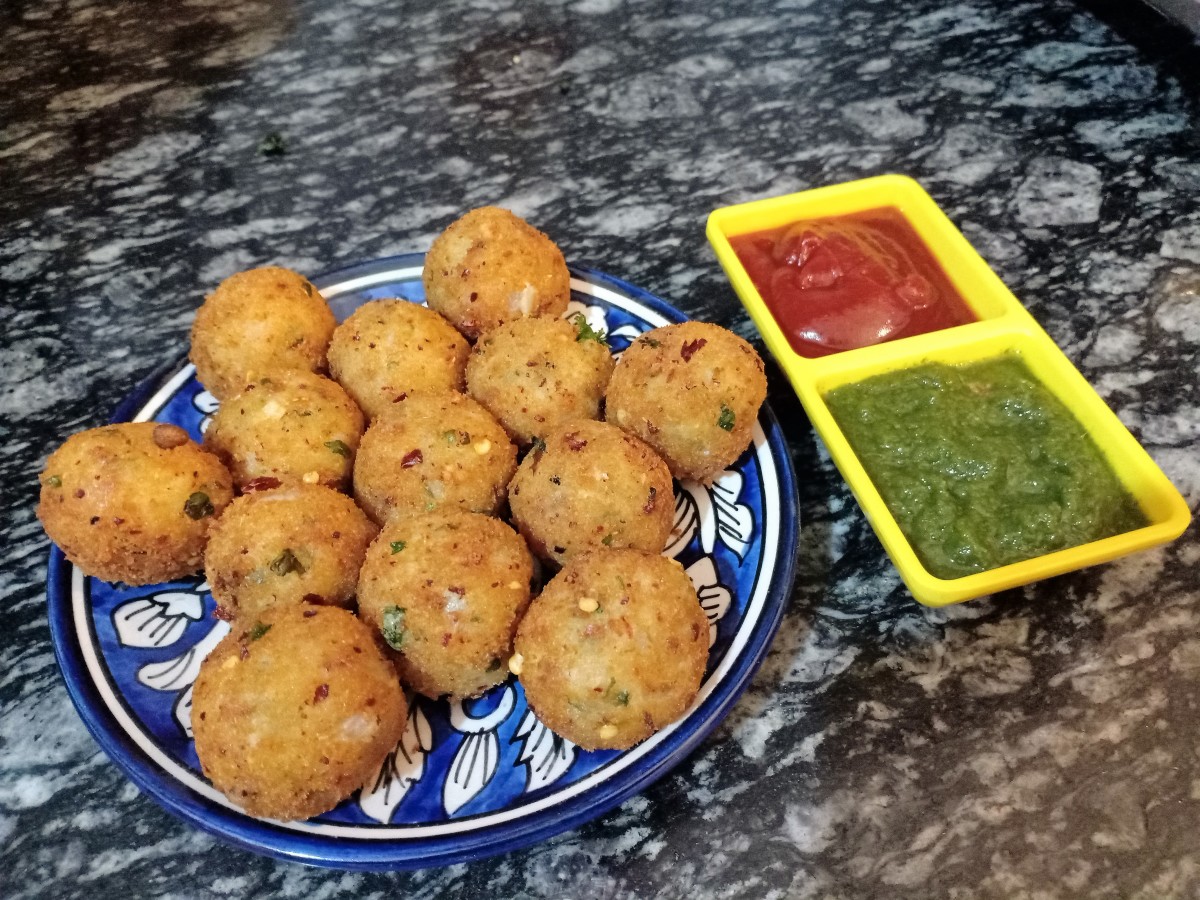 Indian-style cheese potato balls served with mint chutney and tomato sauce