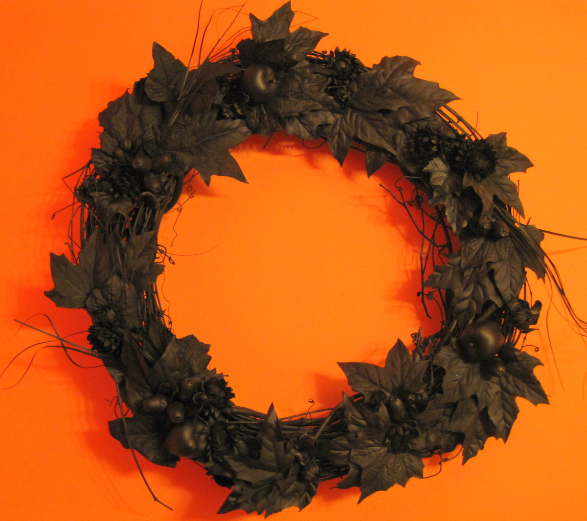Black Halloween Wreath - crafted using a fall wreath simply spray painted black.