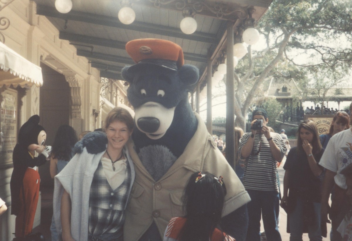 Picture of my friend Jacy with one of the bear characters (1994).