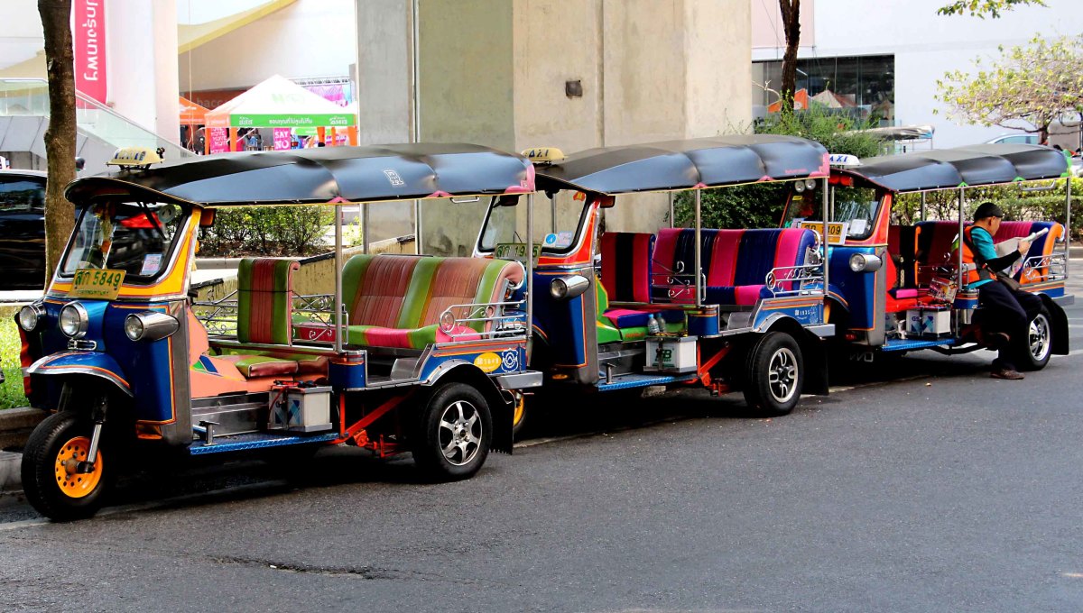 Brightly coloured tuk-tuks parked near the Siam Square shopping district