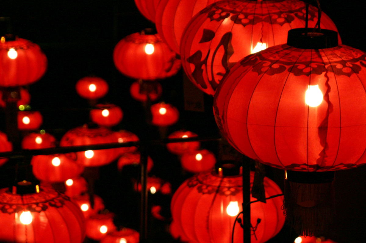 Chinese lanterns are hanged outside homes. 