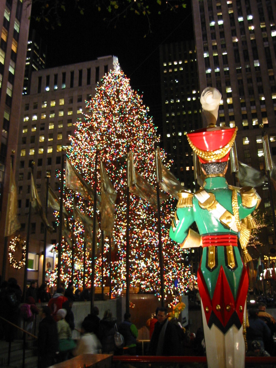 Rockefeller Christmas Tree at Night With Soldier In Foreground