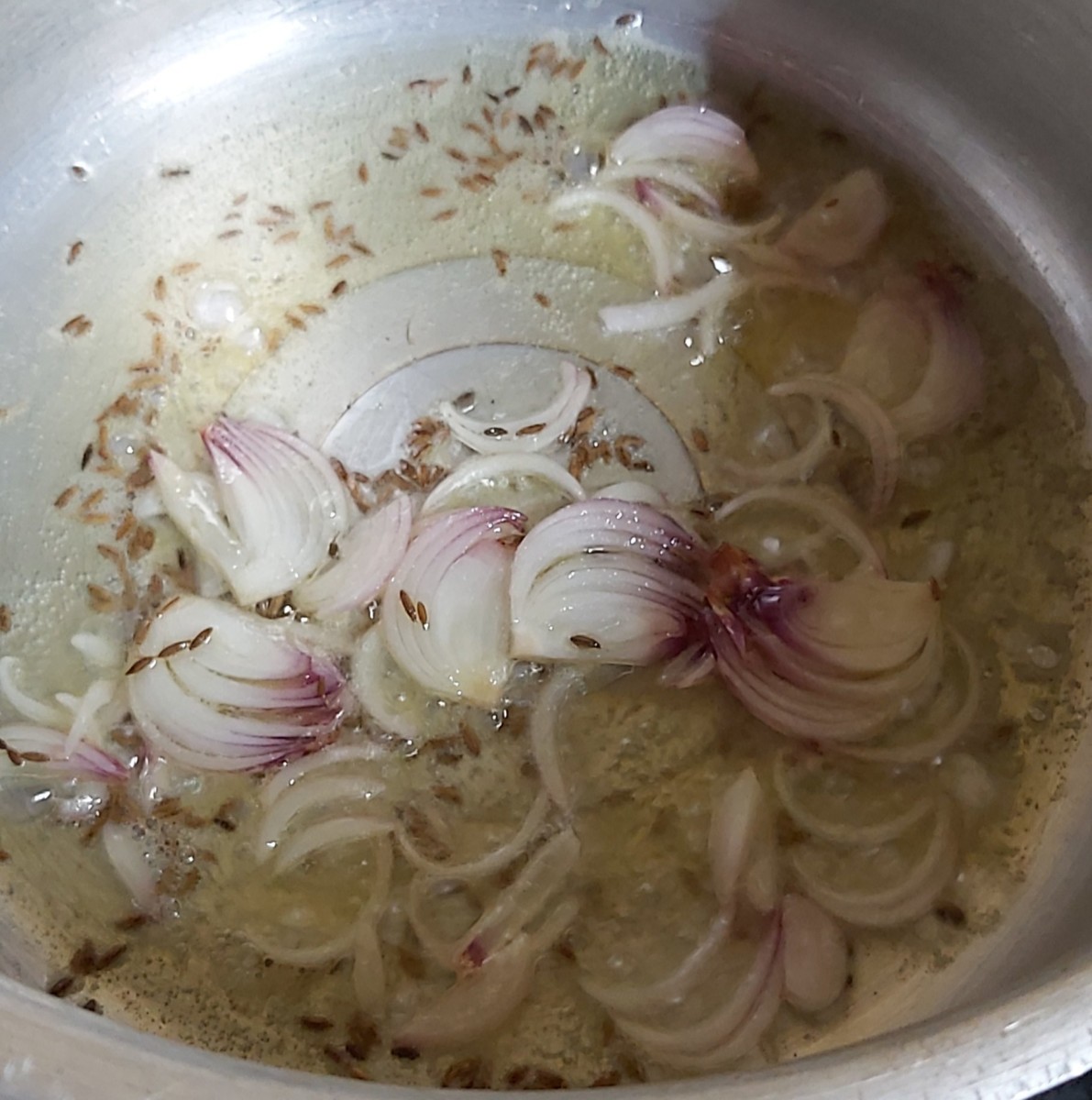 Add chopped onions, fry till translucent.