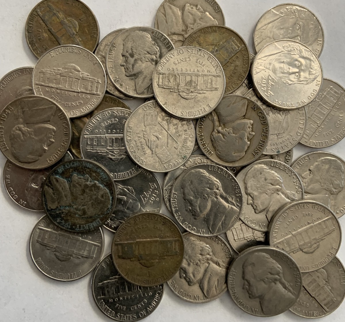 Pile of Jefferson nickels.