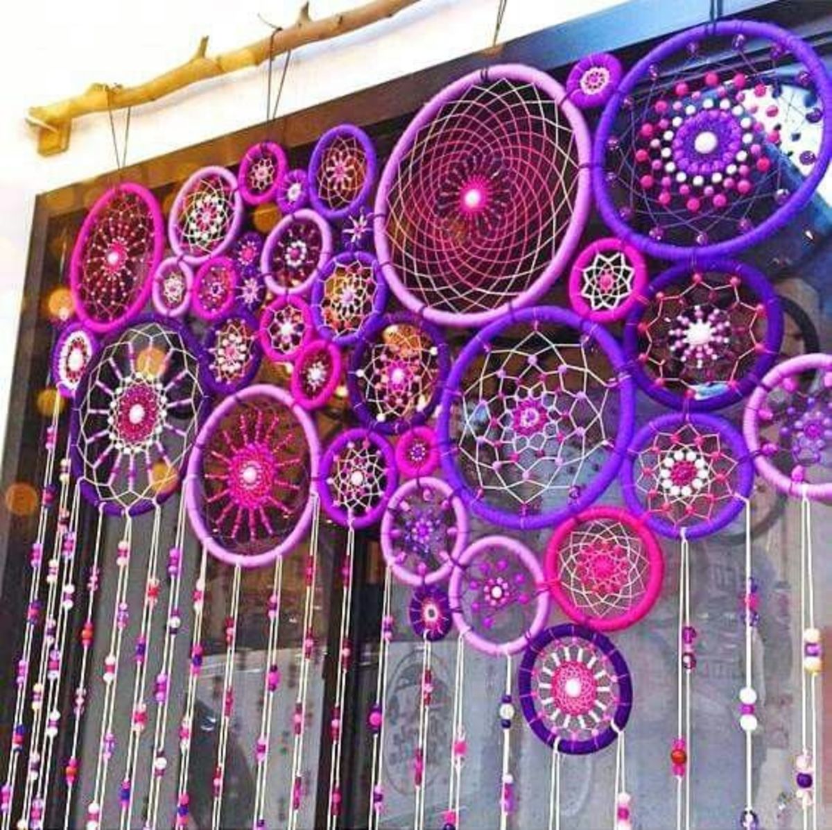 This is actually several dreamcatchers that have been interwoven to create a doorway hanging.