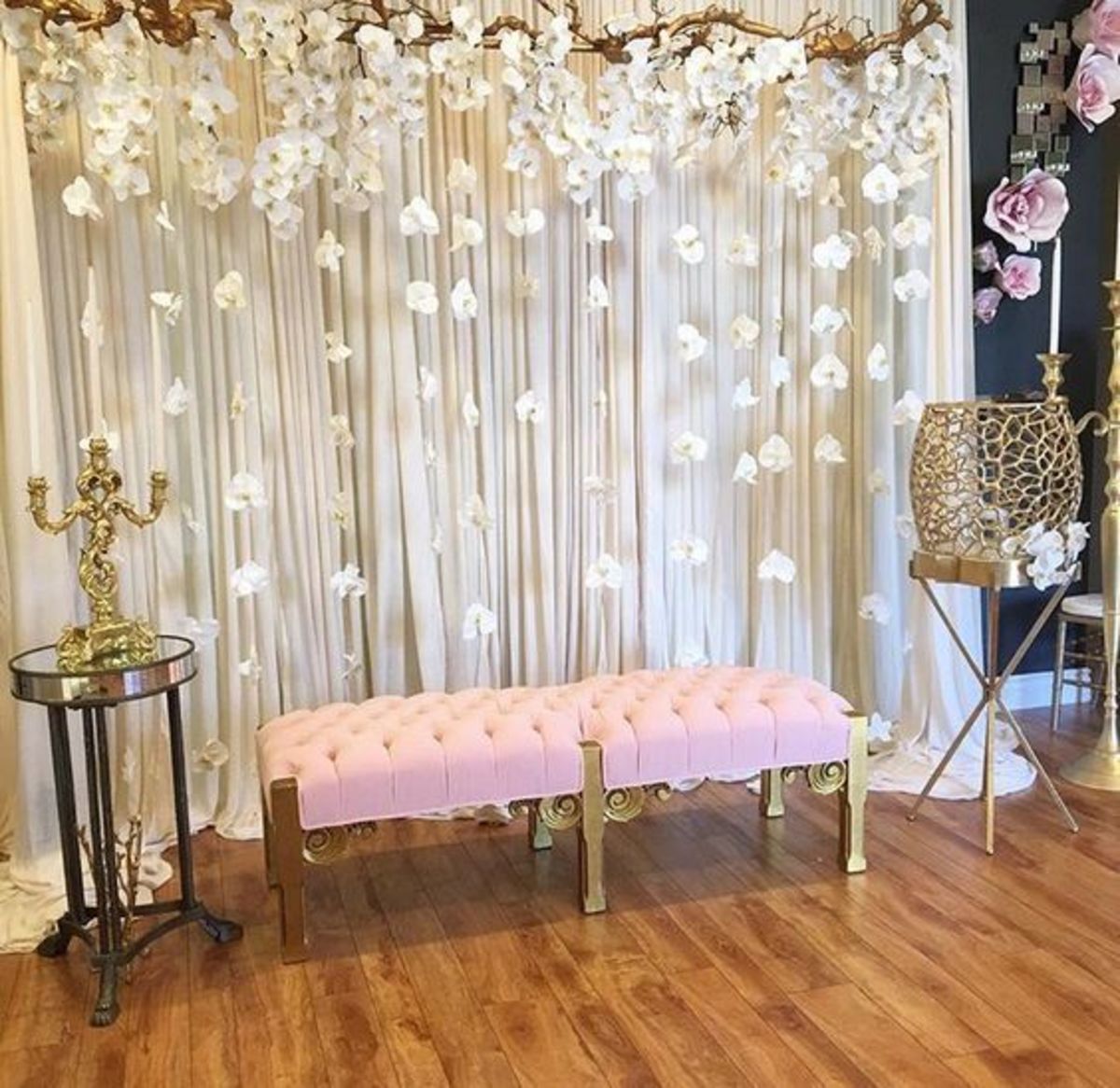 Chiffon backdrop with floral garlands