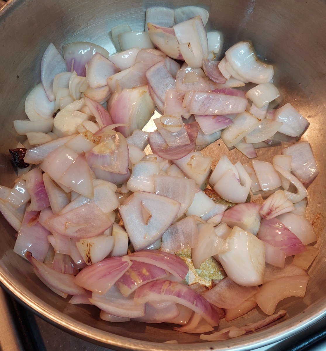 Add roughly chopped onion and saute till translucent.
