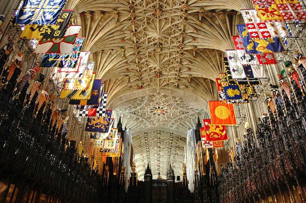 The ceiling of St. George's Chapel, Windsor and the banners of the Order of the Garter's members.