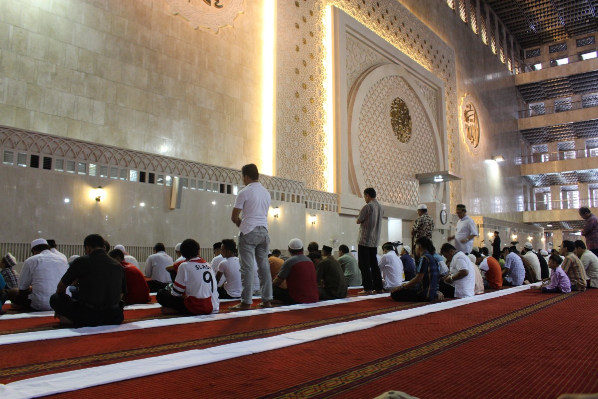 Muslims at prayer in a mosque
