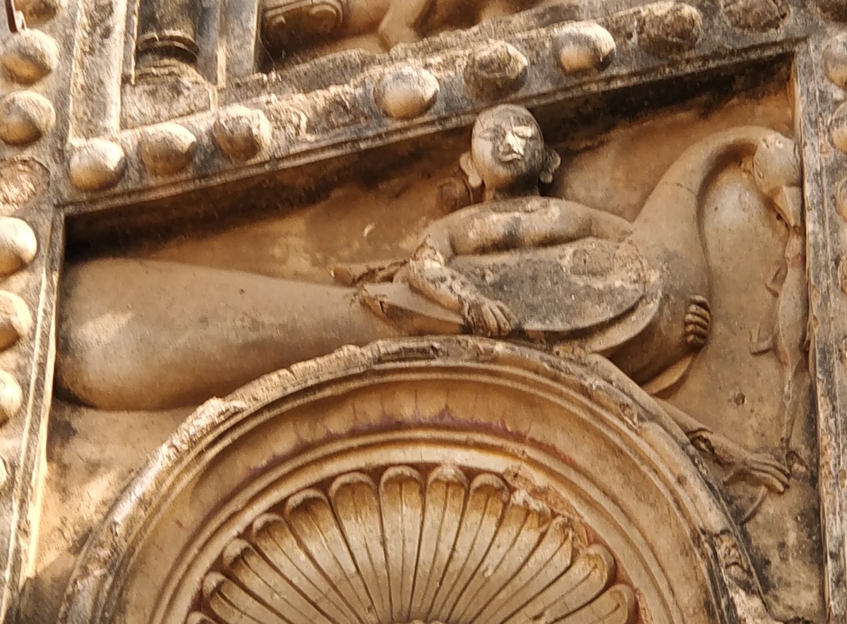 A lady with a peacock ; stucco