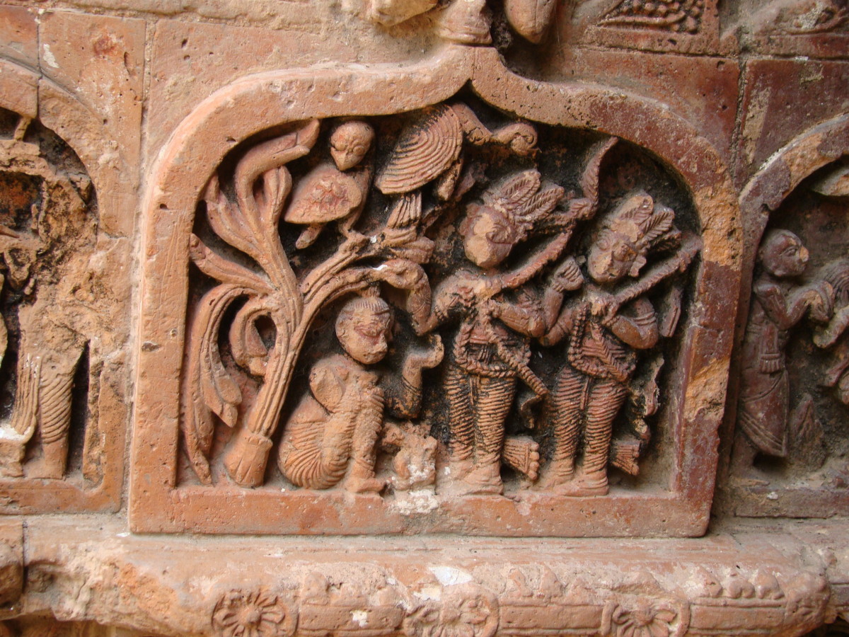 Lord Rama with Guhak (Guha); please note the vultures perching on the tree; terracotta