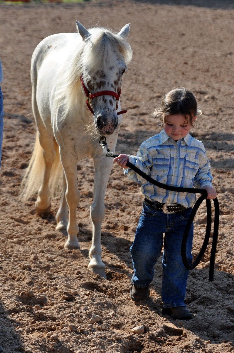 Lucky is the kid that can grow up with a horse!