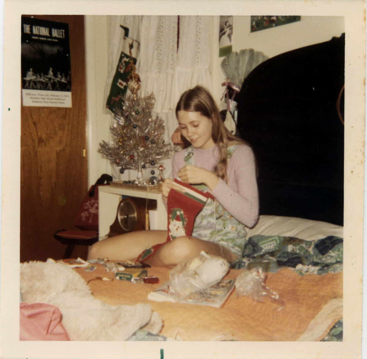 Me in the bedroom I shared with Melanie, celebrating Christmas in the '70s. Note the ballet poster on my closet door, the ballet bag in the chair, and the ballet picture on the wall!