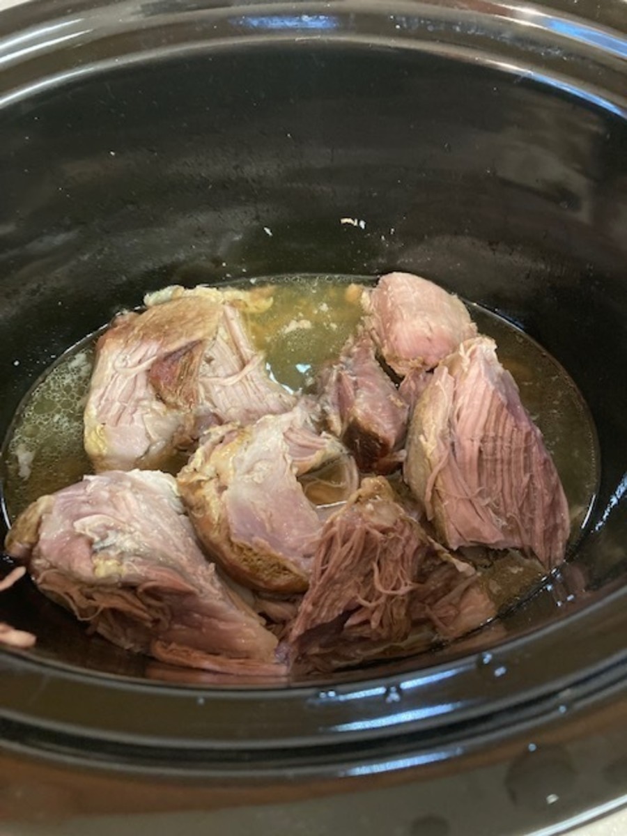 Crock-Pots vary in cooking speed. Follow the directions for cooking times for your pot, but the meat should separate with a fork when done. That's when it is time to add the sauerkraut.