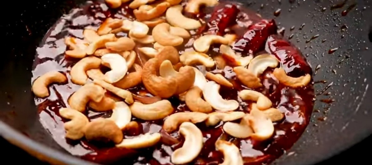 Add fried and sliced cashew nuts.