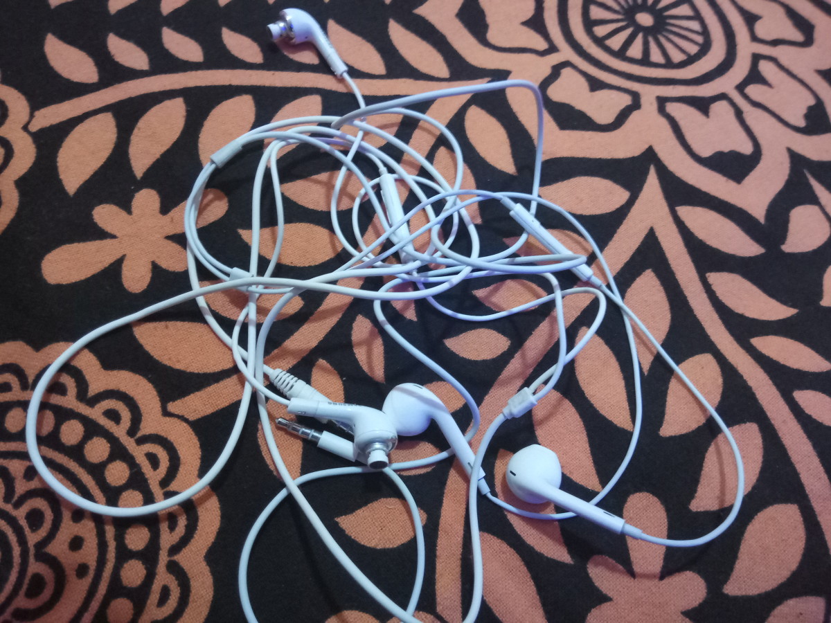Two of many dysfunctional headphones - destroyed by kids.