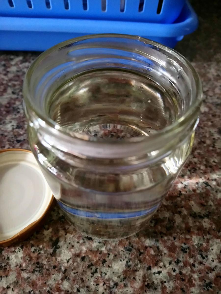 Fill another empty jar with warm water
