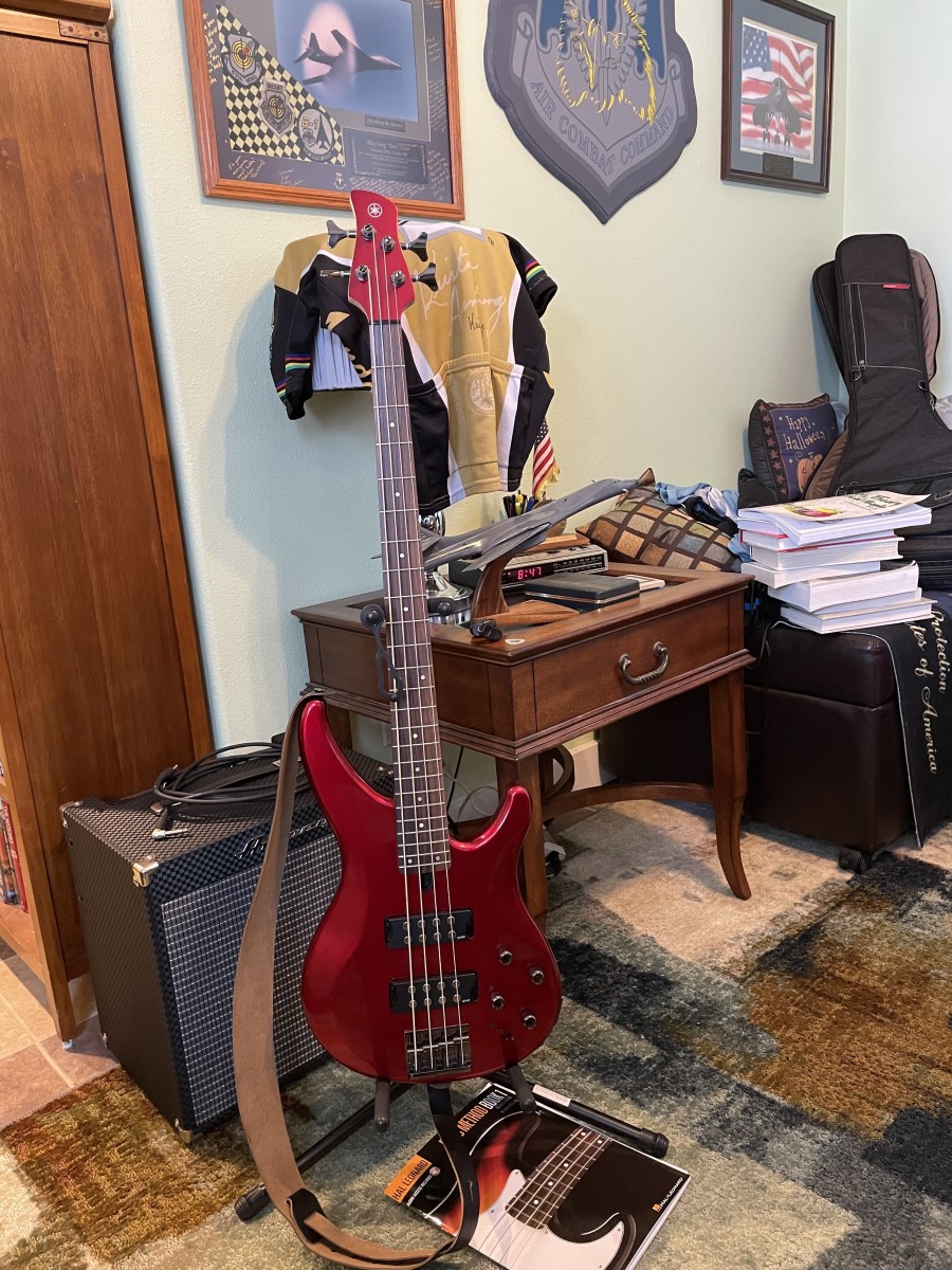 My first bass guitar, the Yamaha TRBX304 in Candy Apple Red