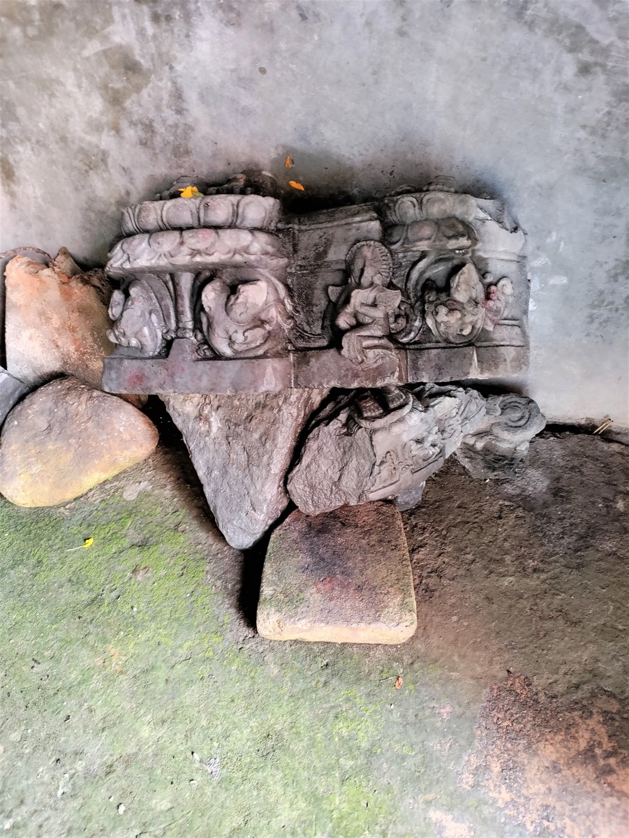 Broken sculptures kept inside the Vishnu temple, Kaleshwar