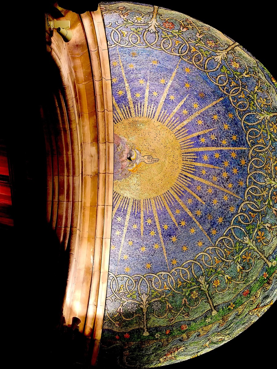 The Creation in St. Anne's Cathedral (Belfast, Ireland). God's hand created the Sun and stars. Most astrologers believe that too.