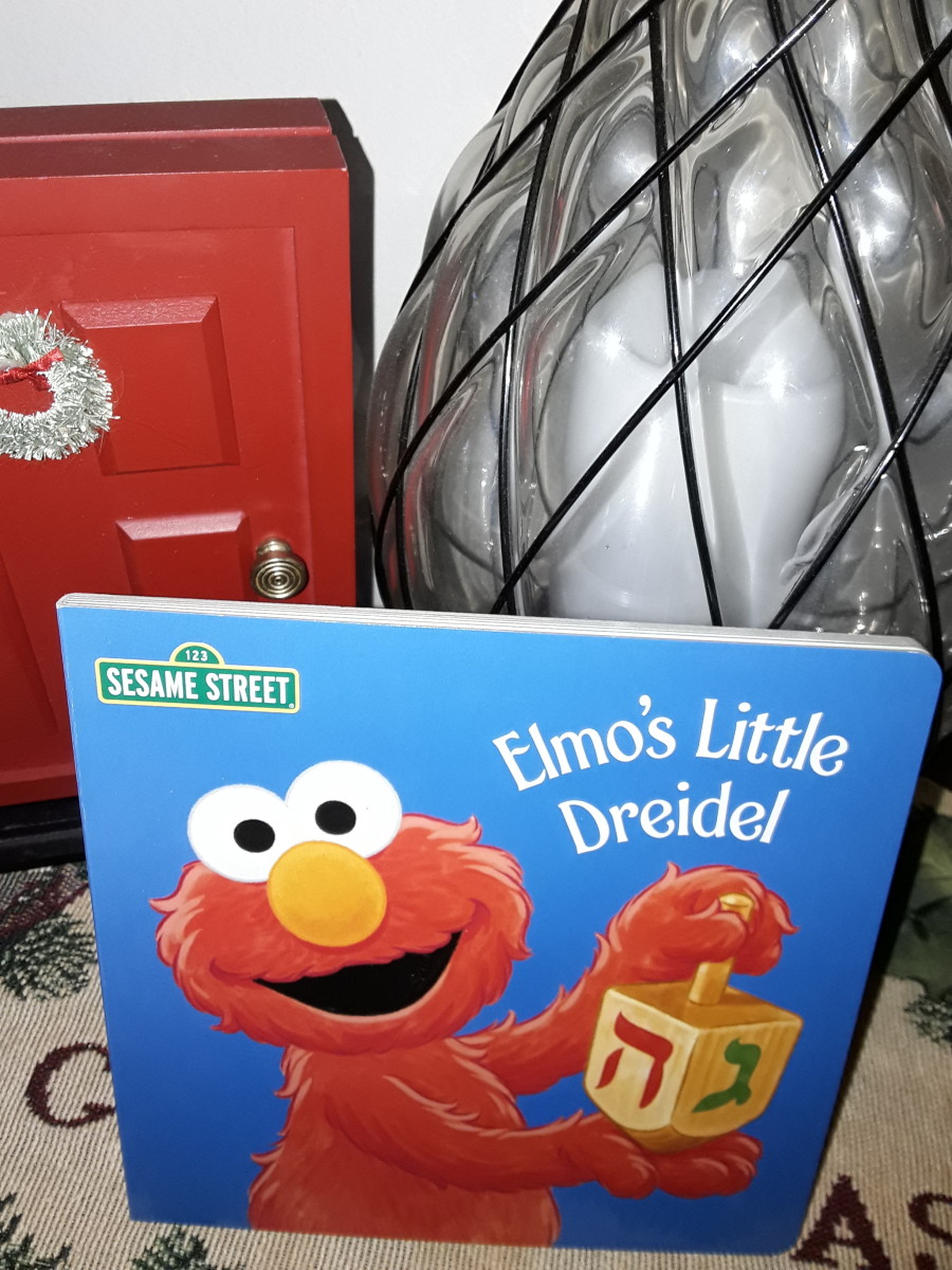 Dreidel Game With Elmo From Sesame Street in Board Book for Celebrating Hanukkah With Your Preschoolers