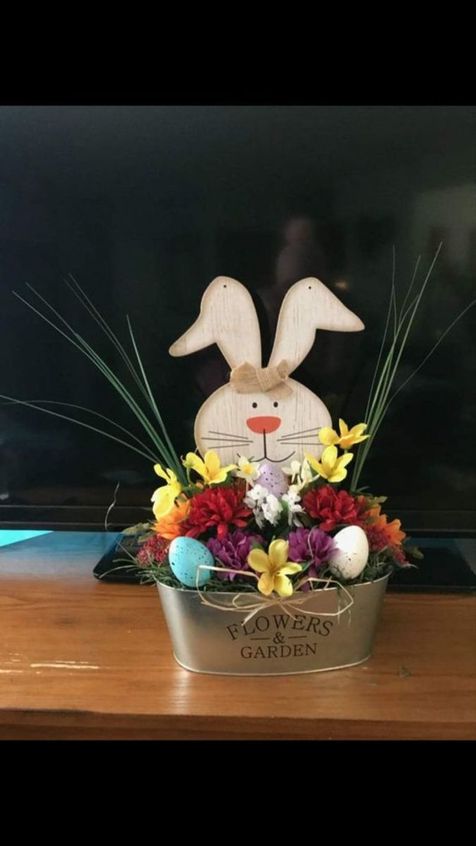 The wooden bunny shapes you can find at dollar stores are really versatile! Here's another idea for a bunny planter.
