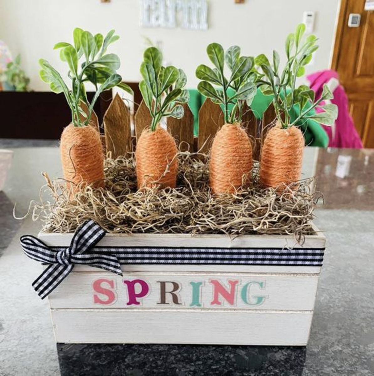 You can also make a planter box using jute carrots. "Plant" them in some faux moss for a realistic appearance.