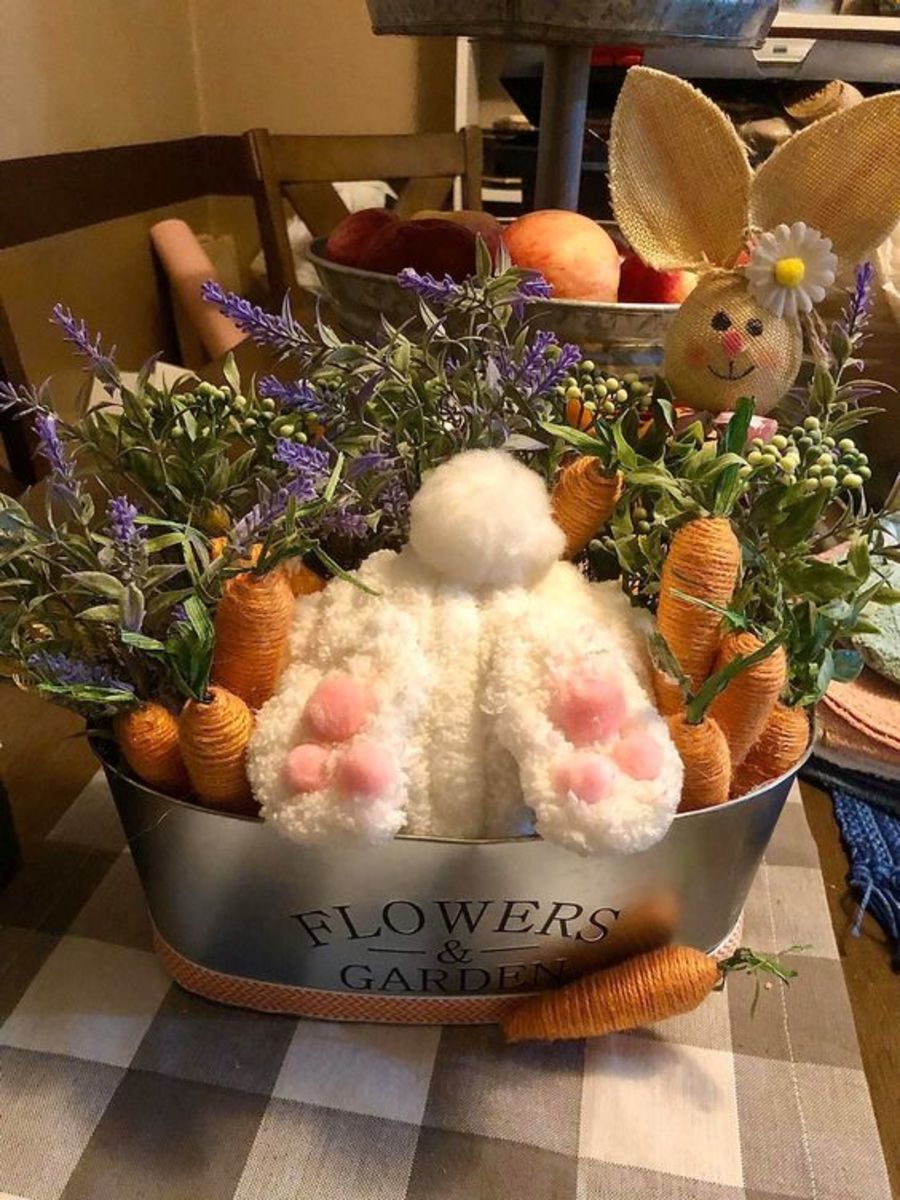 This bunny planter uses pink pompoms to create the bunny's toes.