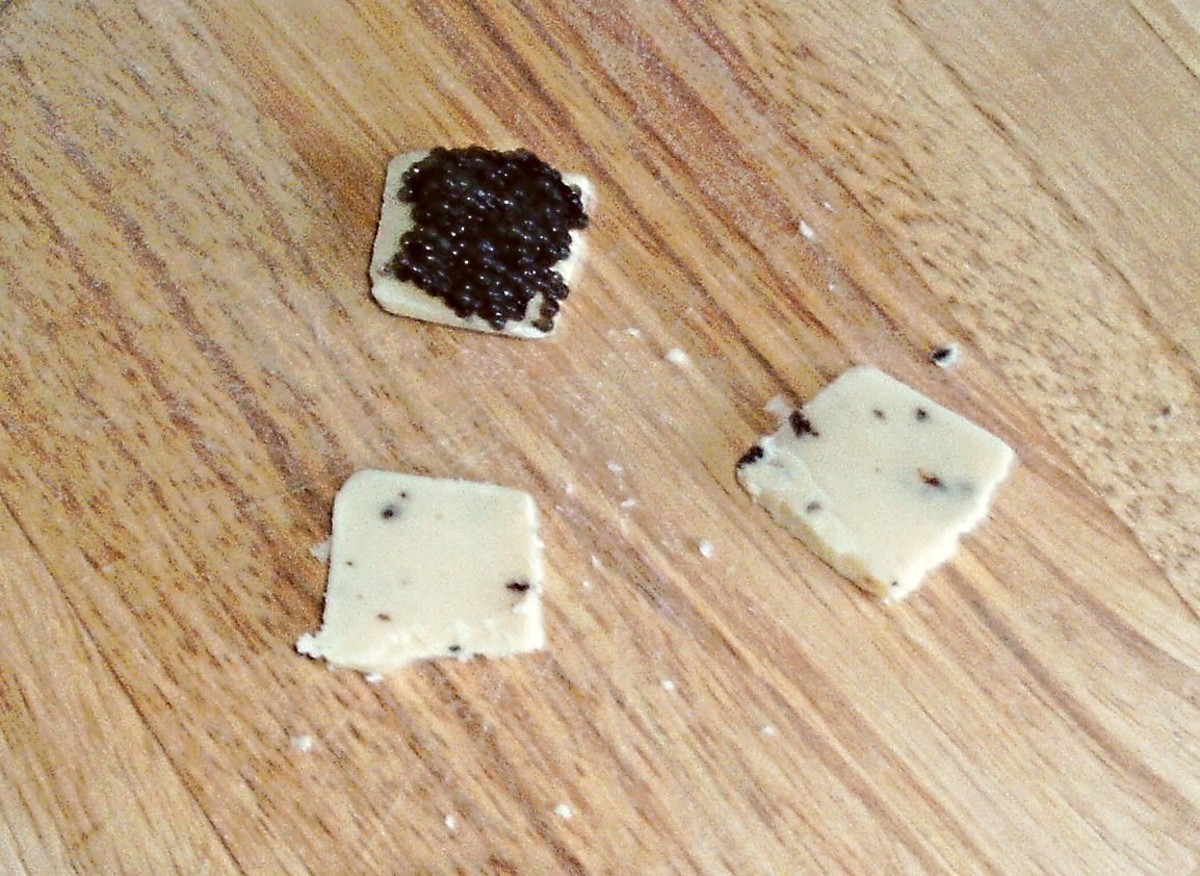Caviar is spread on truffle infused cheese.