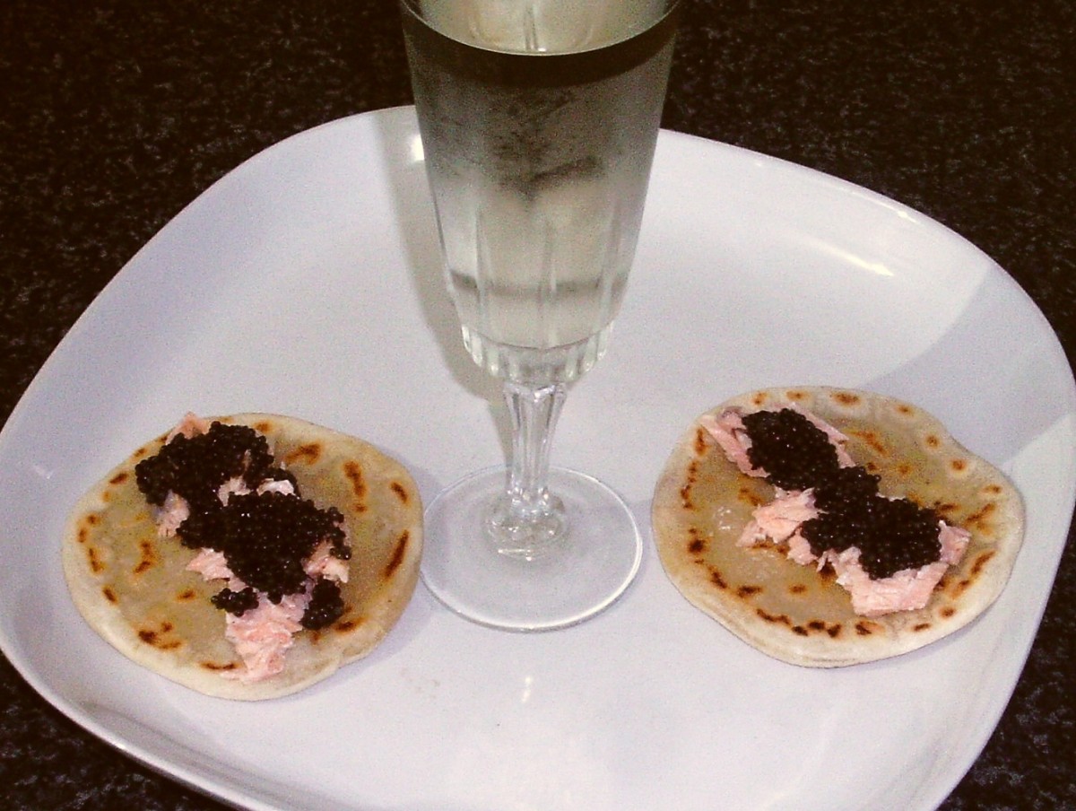 Caviar and salmon flatbreads with champagne