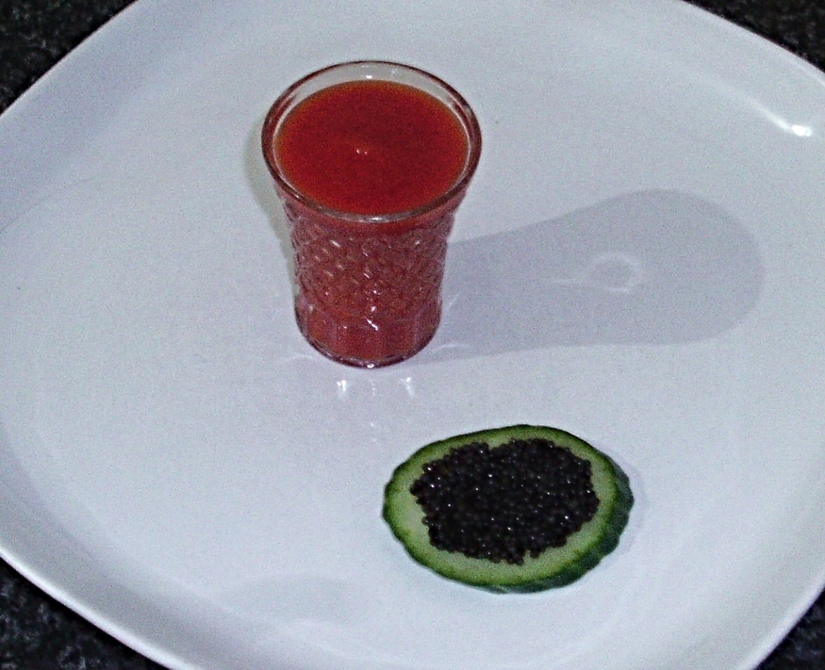 Caviar on cucumber is served with a Bloody Mary