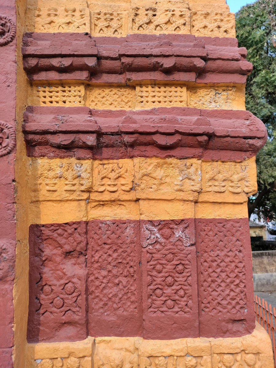 Recently painted terracotta decoration at the base; Nrisinghadeva temple, Gokarna