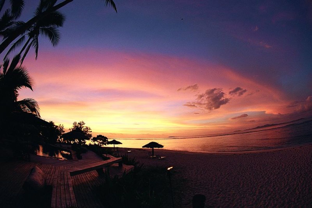 Sunset at the resort end of Tavarua Island, Fiji.