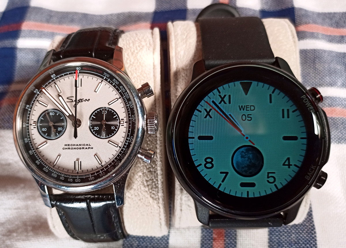 The Magic 4 and my Sugress mechanical watch.  The face of the Kospet device appears dim because I am shining a bright light at it.