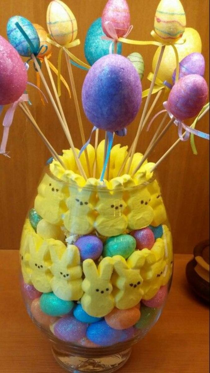 This is a complex display of Peeps, eggs, and egg sticks!