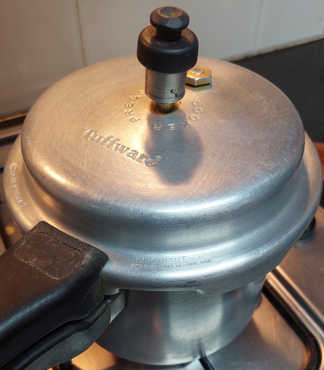 Close the lid of cooker and take 3 whistles. Switch off the flame and let the pressure release naturally.