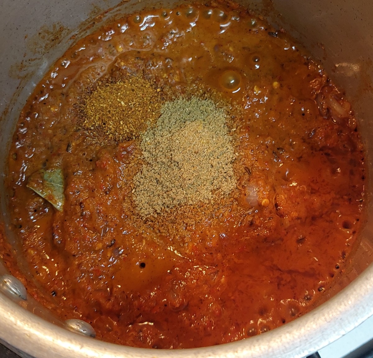 Add ground paste, 1 teaspoon coriander powder and 1/2 teaspoon garam masala powder. Fry for 2-3 minutes.