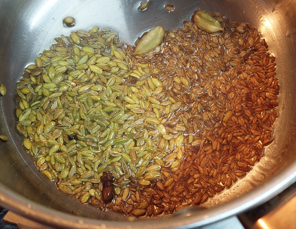 Add 1 teaspoon of cumin seeds and 1 teaspoon of fennel seeds (saunf). Let them splutter.