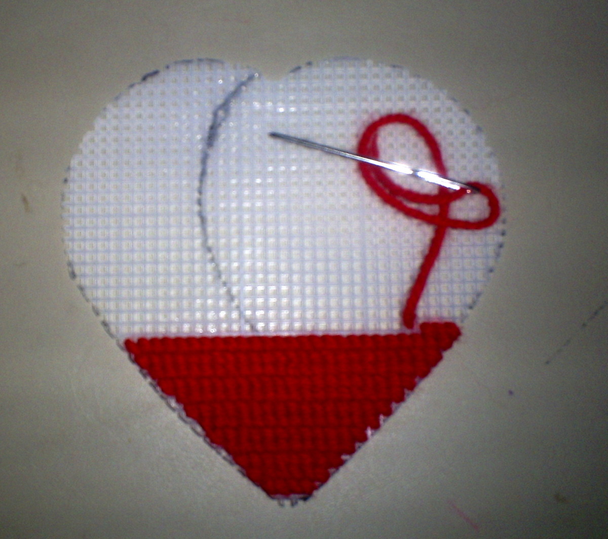 The heart is about a third of the way cross stitched.